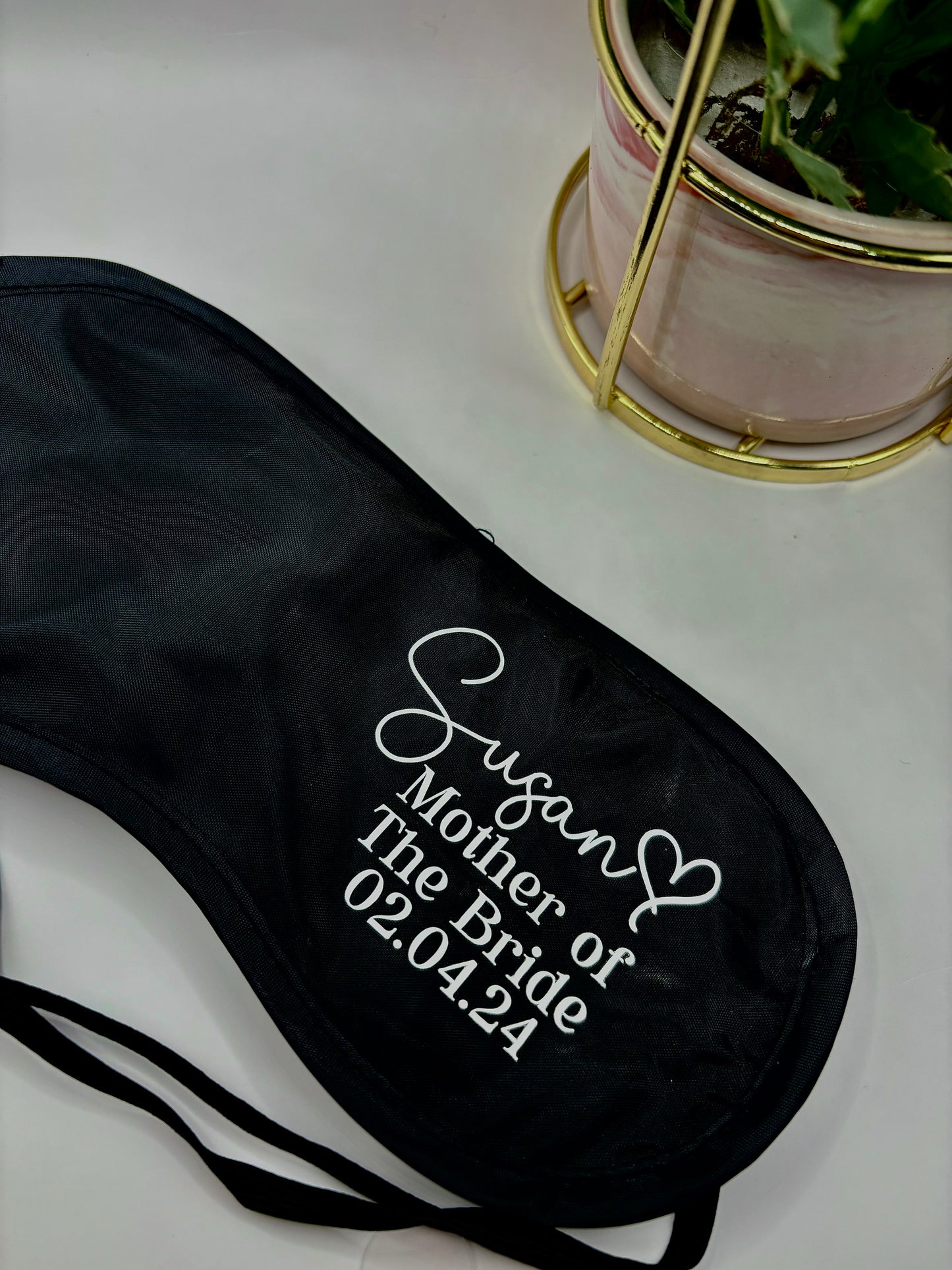 Personalised wedding sleep eye masks for bridal party. Includes name, title and date of the wedding