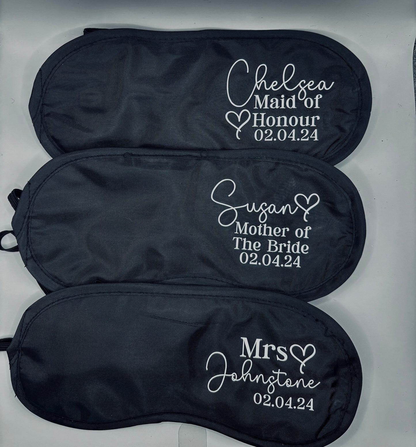 Personalised wedding sleep eye masks for bridal party. Includes name, title and date of the wedding