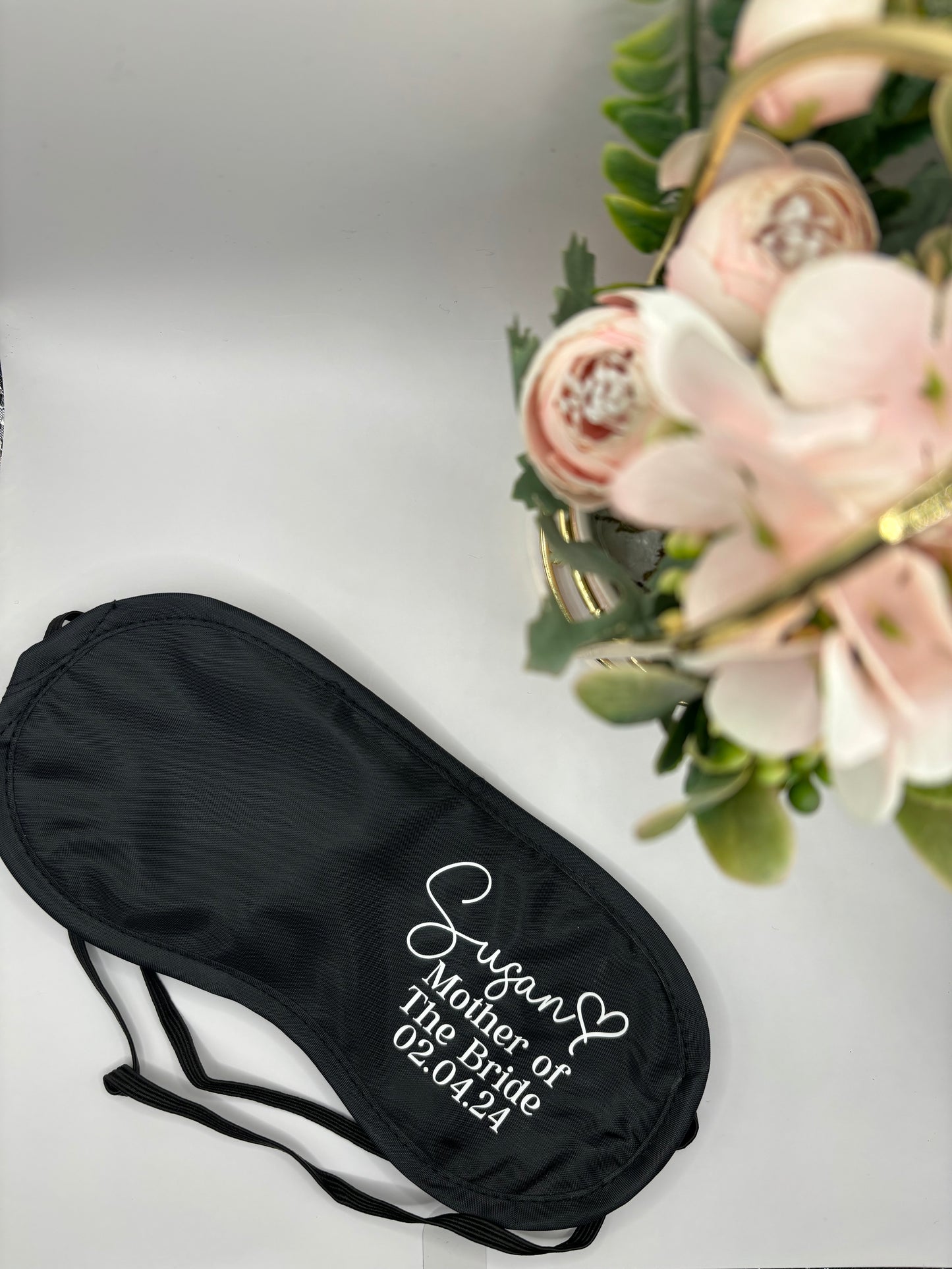 Personalised wedding sleep eye masks for bridal party. Includes name, title and date of the wedding